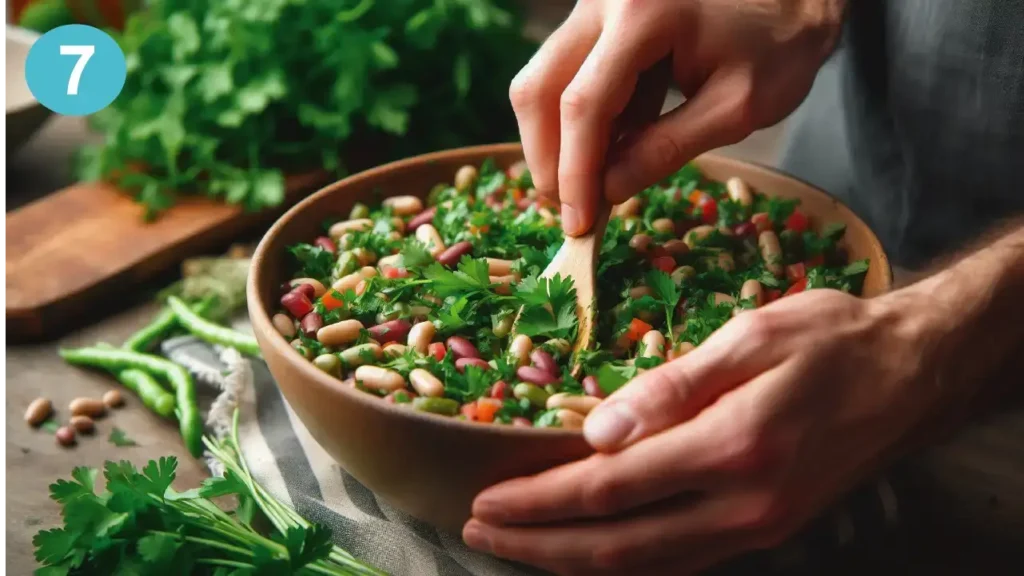 Decorating dense beans salad with Fresh Herbs